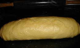 Roll up the dough and pinch the seam to seal.