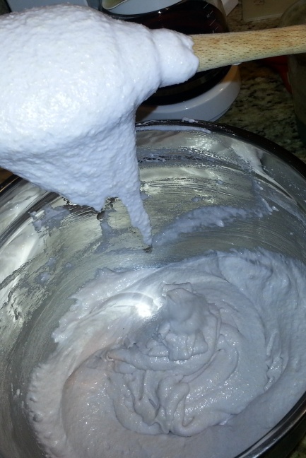 Fold the almond-sugar mixture into the meringue, until the batter reaches the right consistency.